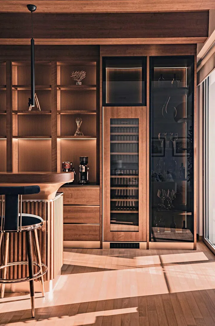 The wine fridge and glass cabinet are integrated beautifully with woodgrains and dark-tinted glass.