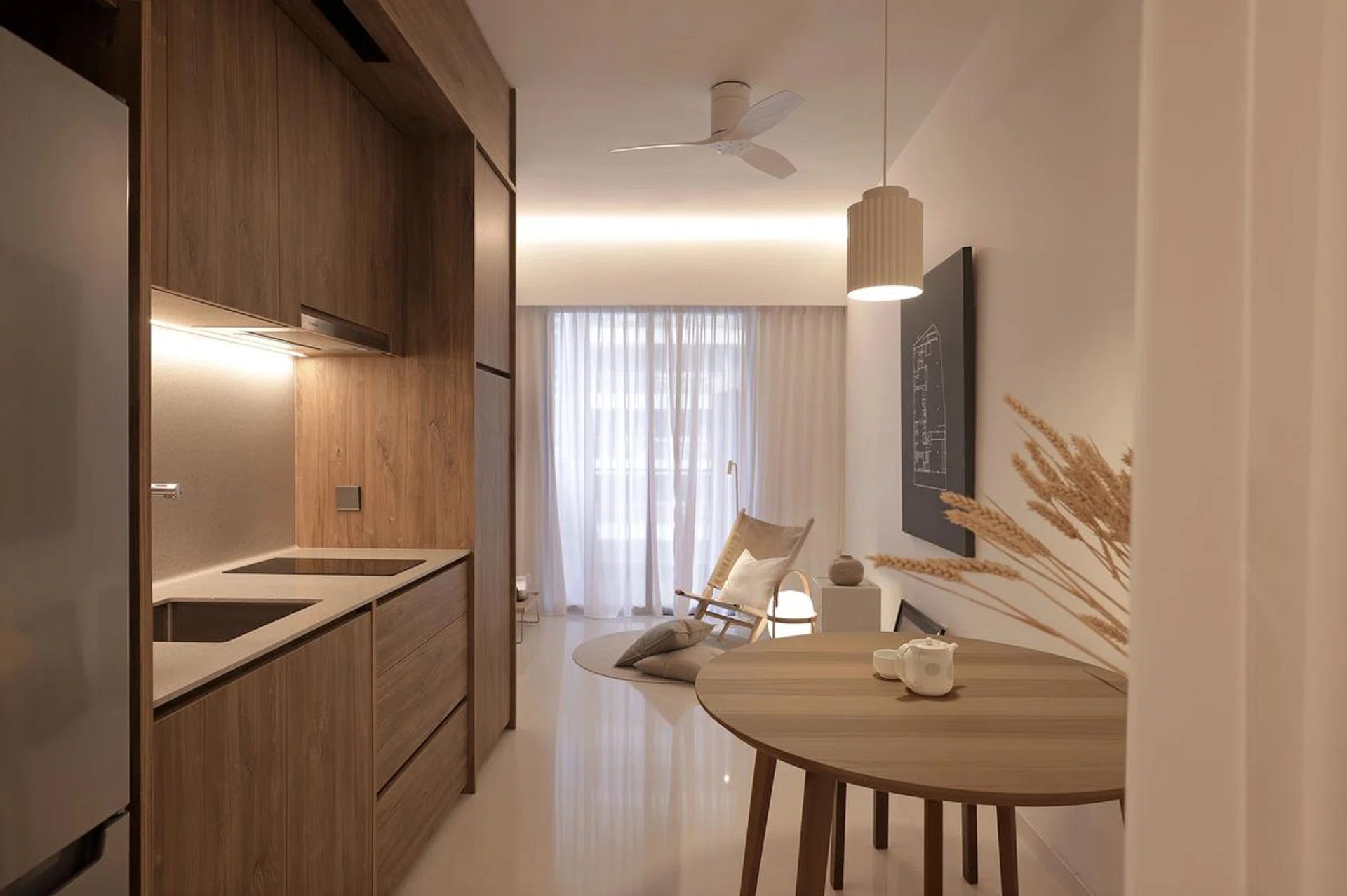 Working with the existing homogeneous tiles, the design team introduced a neutral palette through the Lisabo table from Ikea, woodgrain laminates from Lamitak and Cesta Table Lamp from Santa & Cole.