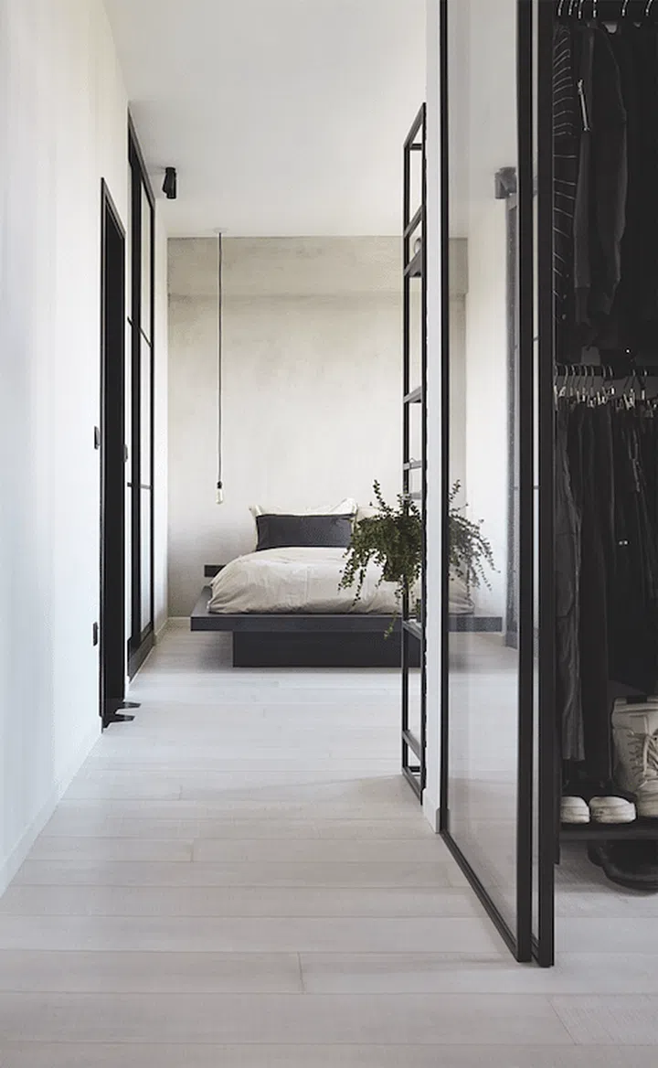 The door of the master bedroom was removed to create a larger open space.