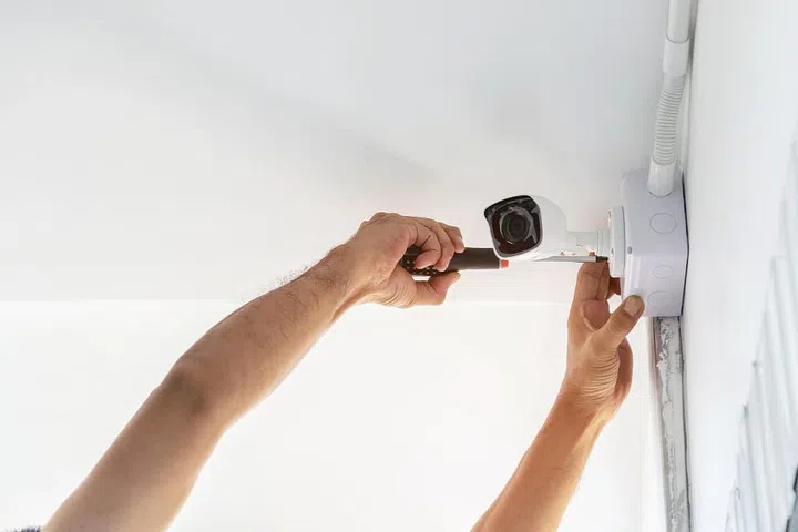 technicians-using-screwdriver-install-cctv-cameras