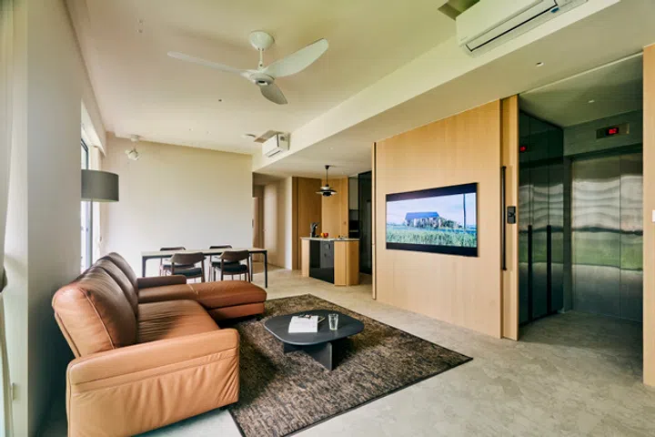 An example of this home’s open plan kitchen dining room and living room.