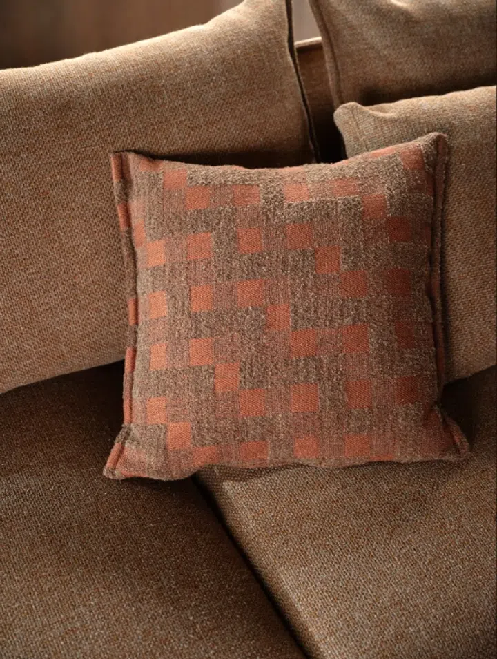 Earthy tones offer an enduring palette, bringing warmth and versatility to a considered interior.