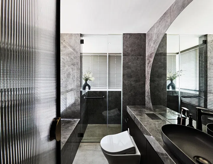 Jeneen opted for marble- look tiles in the master bathroom to achieve the look that she wanted while being mindful of the budget.