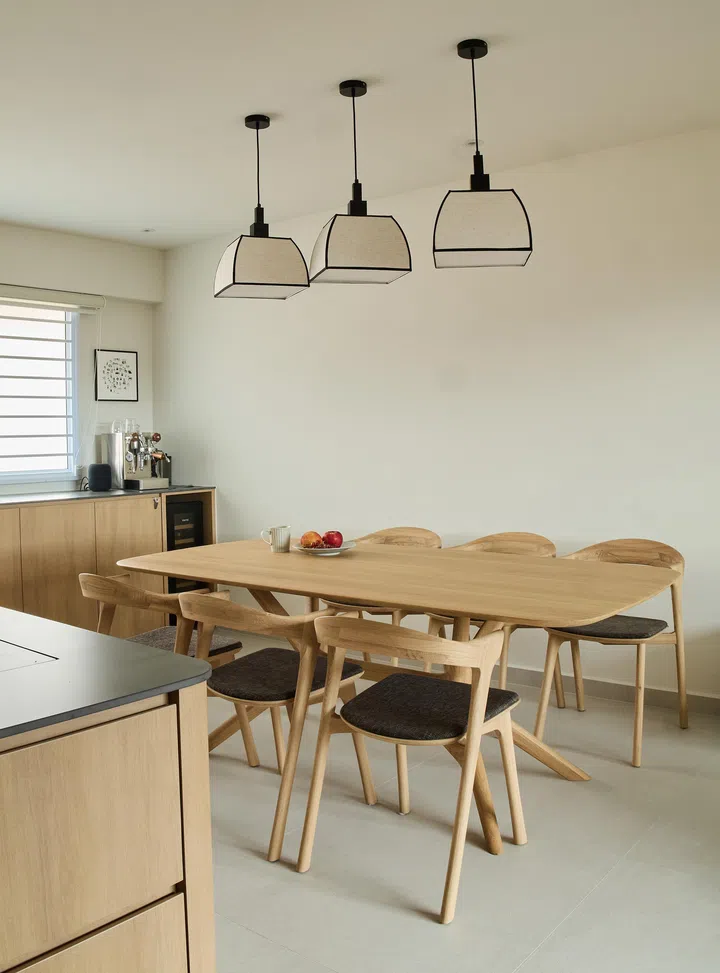 Next to the kitchen is the dining area, with coffee station and more storage. 