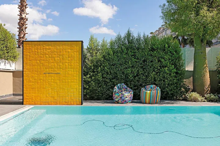 Poufs by Missoni. Zellige tiles from Galleria Elena.