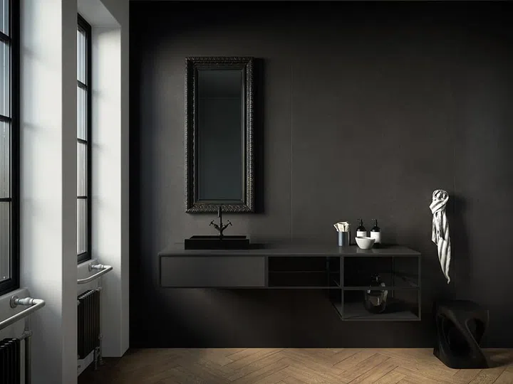 A dark bathroom clad in Dekton Slim Eter from yje Portfolio '20 collection. 