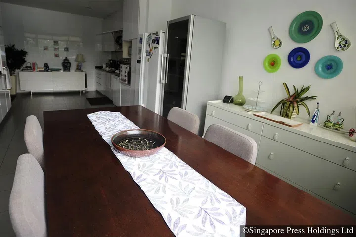 The dining table in the kitchen is where Pooja Kapur and her family take their meals. Ms Kapur is the owner of former lifestyle store Benares at ION Orchard (now closed).