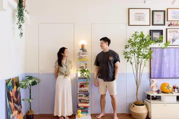 Homeowners Terence Chua and Zoey Lee pose for a photo in their 5-room HDB flat in Yishun, designed by Homely Matters Pte Ltd.