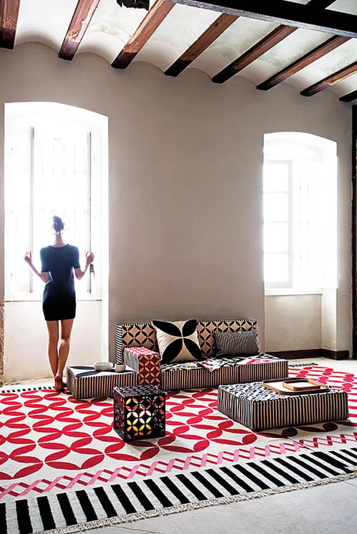 The Espacio Touareg collection by Gan features rugs, lamps, and cushions in Mediterranean-influenced motifs displayed within P5 Studio's former showroom located along Purvis Street.