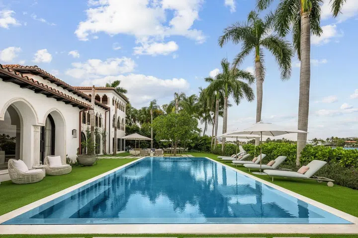 Mature palm trees and 158 of shoreline frontage make for a spectacular lot.