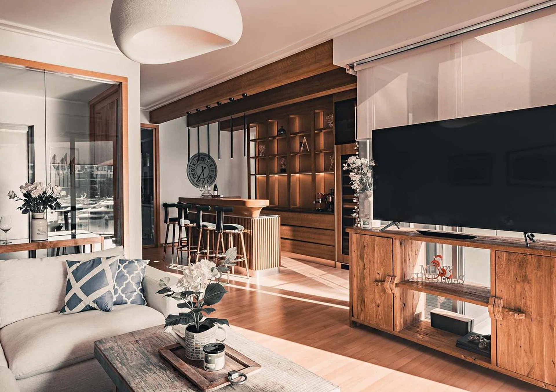 Light floods the home during the late afternoon, highlighting the lines and textures.