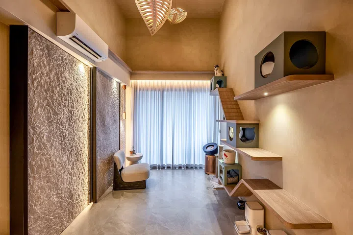 The integrated cat highway allows all four cats to move freely without overwhelming the resort-inspired interior.