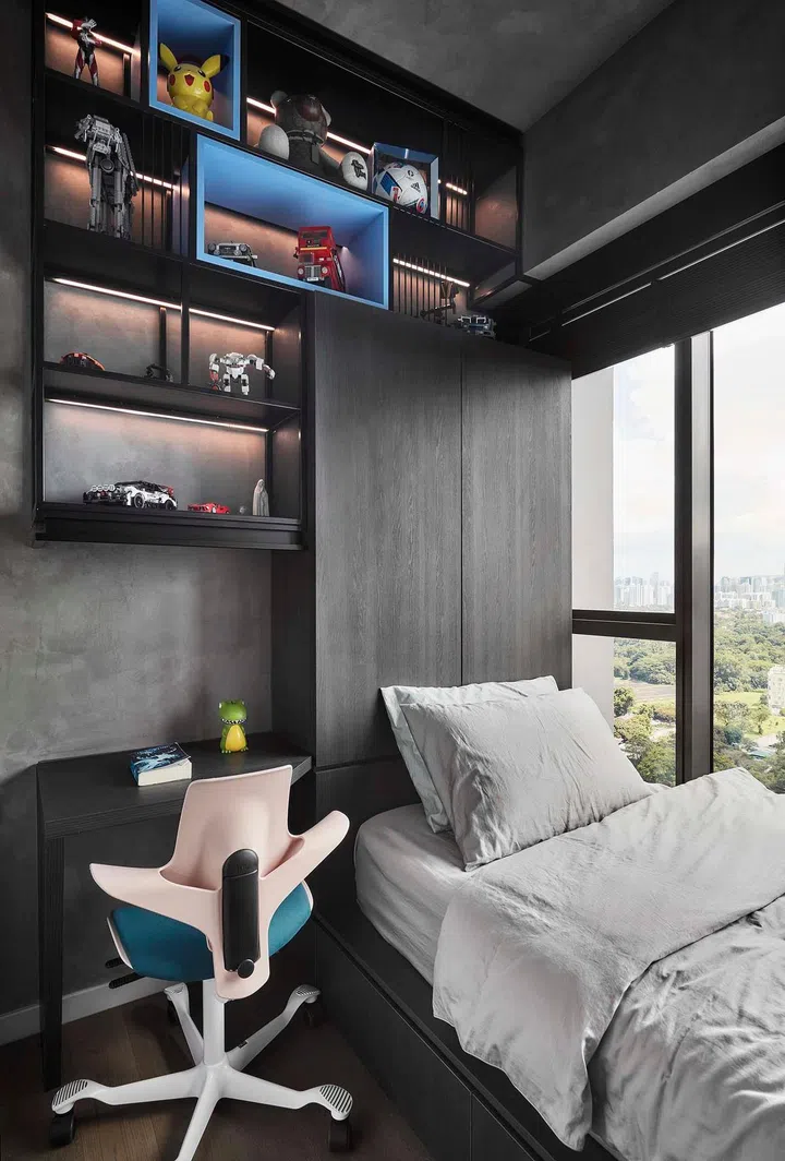 The all-black interior design theme continues in the son's bedroom in this 1,184 sq ft 4-bedroom condo in Queenstown.