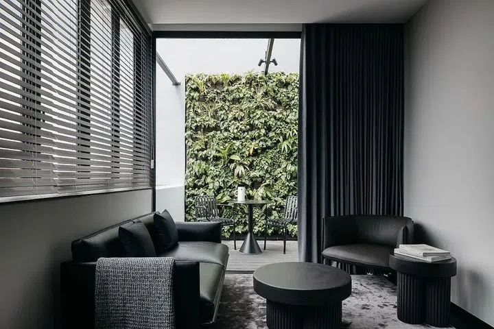 The secondary living space on the upper level is Justin’s personal sanctuary, where he recharges throughout the day.