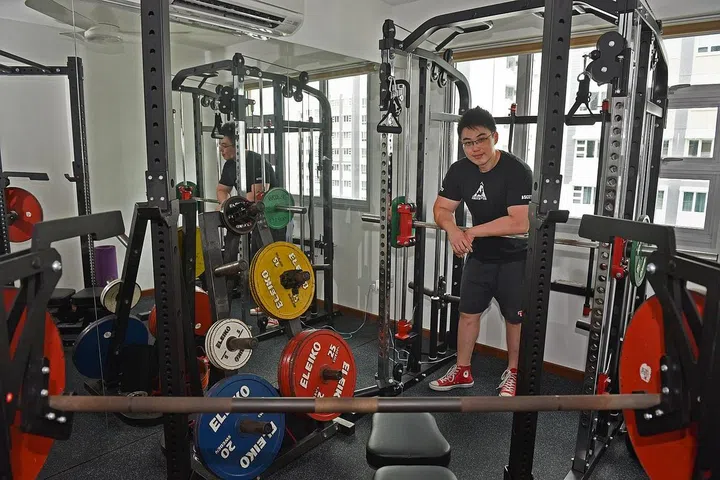Power lifter Max Wang found out that having his personal gym at home helped when he was preparing for competitions.