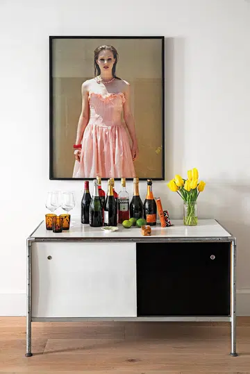 Engaging artwork adorn the walls throughout this home exuding warmth and cosiness.