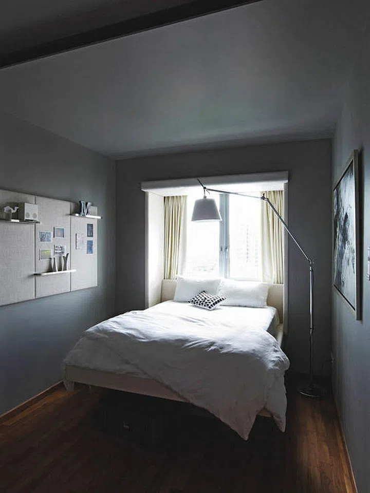 Create an extra cosy nook by placing your bed frame over the bay window ledge, up against the window.