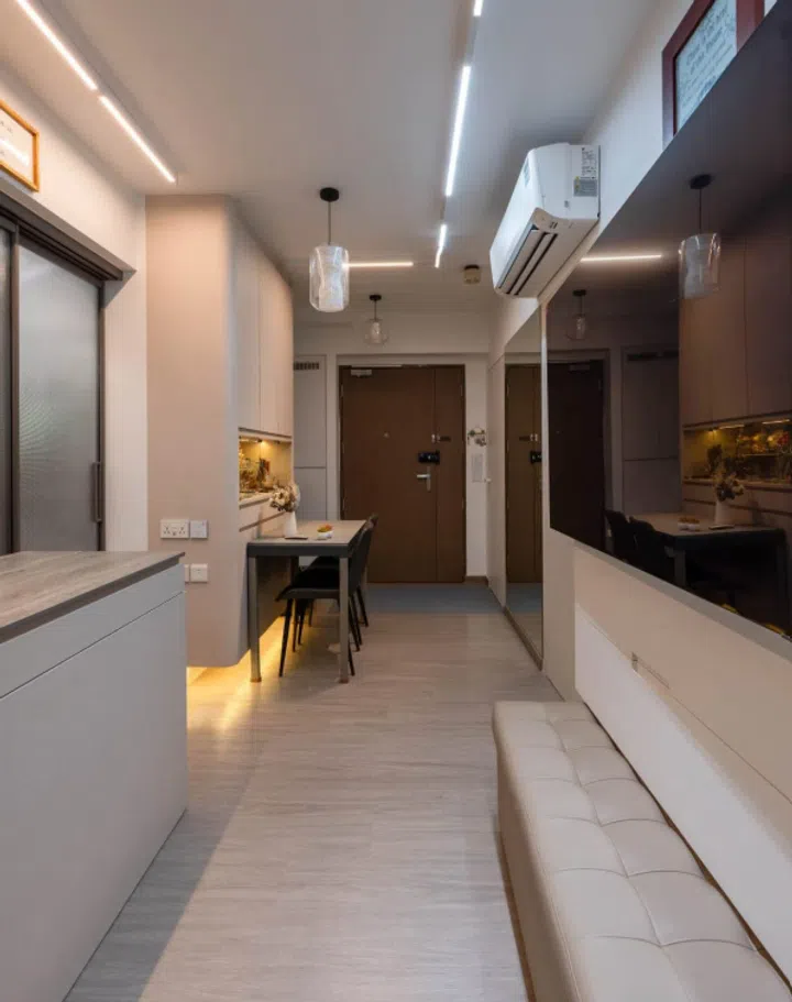 The rectangular living and dining area incorporates ample storage while keeping the walkway clear.