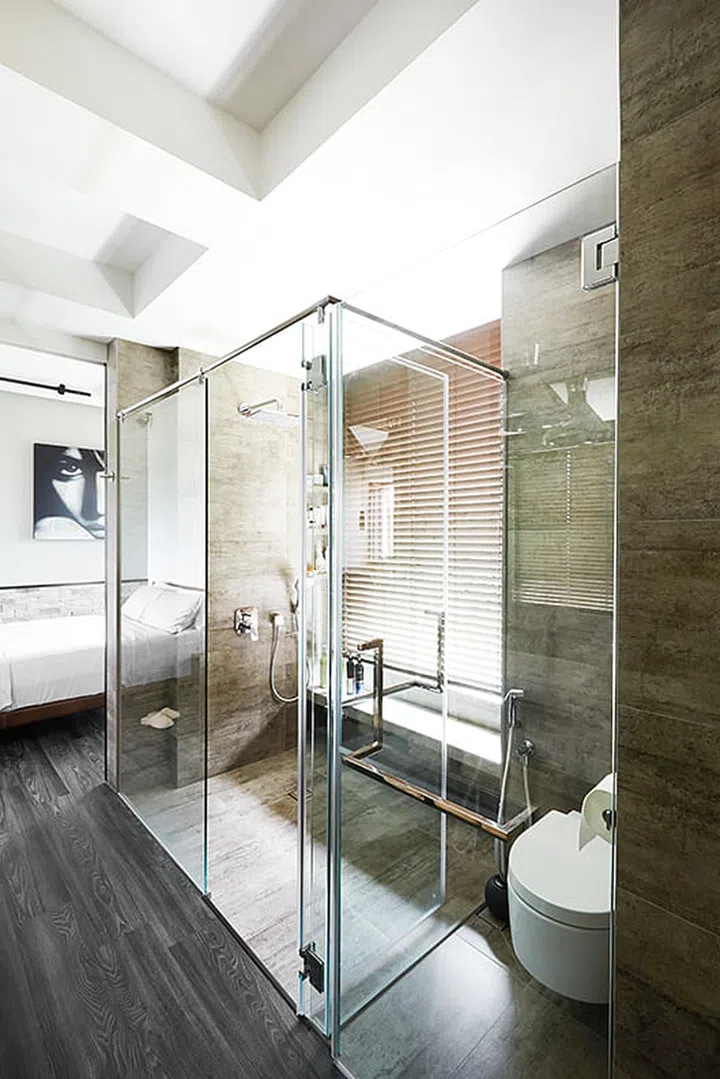A roomy open concept bathroom stands between the master bedroom and a room that was converted into a walk-in wardrobe. (Total Renovation costs: $150,000). Interior design by Habit LLP