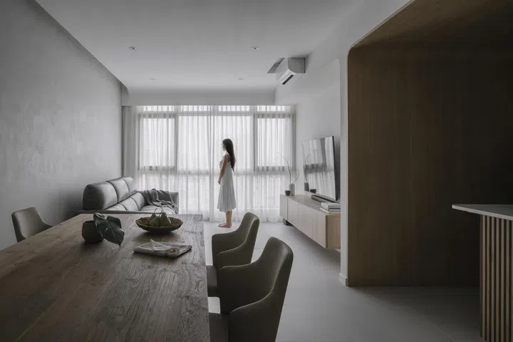 Living room in a young lawyer couple's 3-bedroom condominium in Bishan.