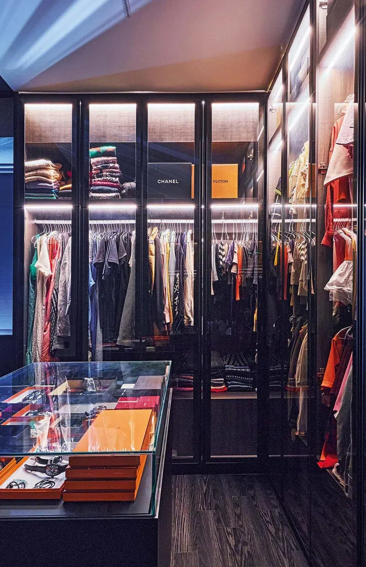 The walk-in wardrobe has motion sensor lighting, just like a hotel.