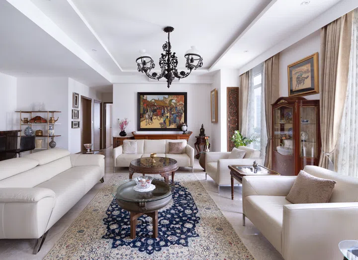 The living room acts as a museum of heirlooms and trinkets collected over the years.