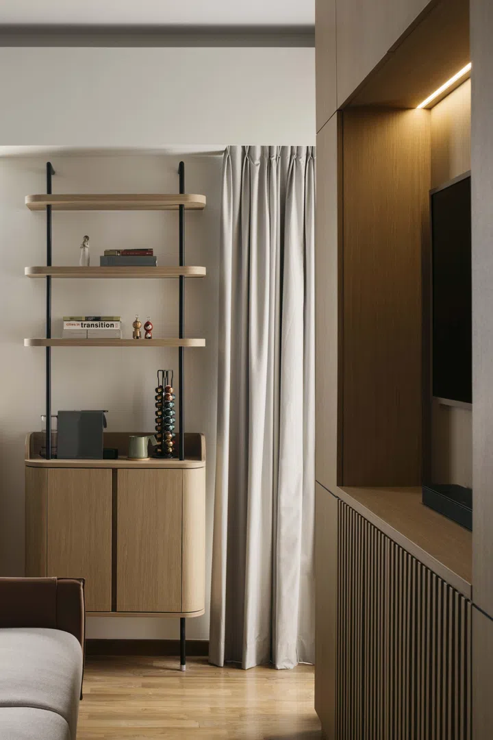 Open shelving allows books and objects to remain visible, turning storage into a form of memory-keeping.