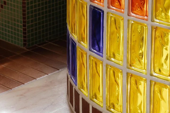 Coloured glass blocks came naturally to the homeowners.