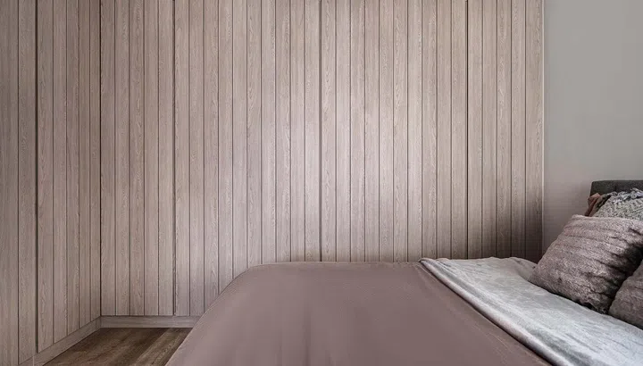 A bed and wardrobe