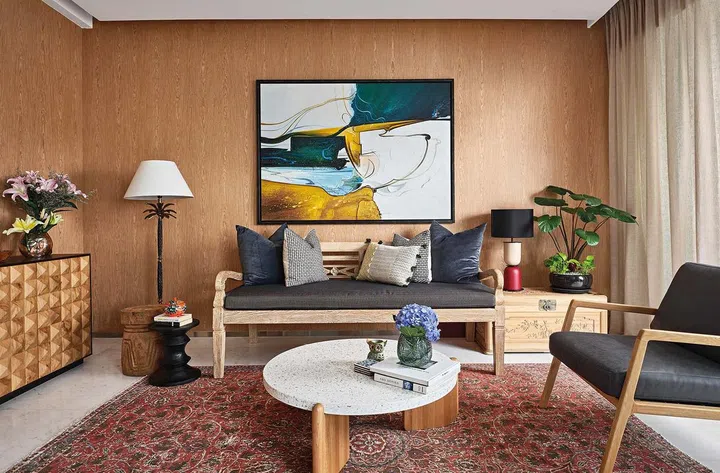 Nidhi also curated the artwork. This one in the living room is chosen for its complementary colours and feng shui compatibility.