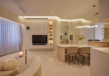 Lee Zeng Cong & Helen Chin’s all-white living room in a 3-bedroom condominium apartment in Leedon Heights.