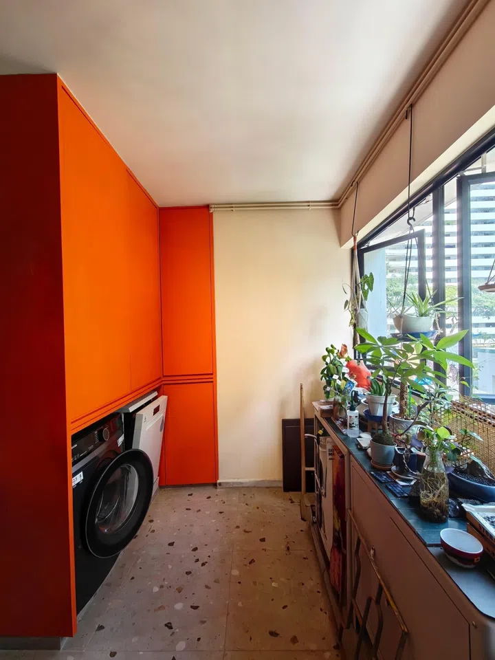 The orange cabinets in this room are one of Avin’s favourite colours.