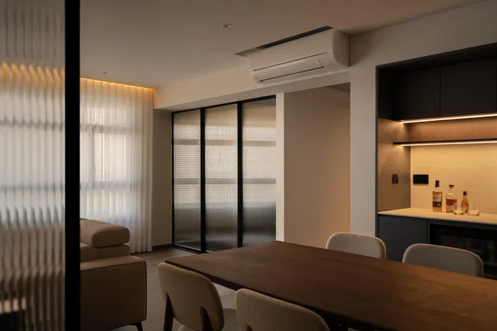 Concealed home office in a 5-room HDB BTO at Tampines Street 96 (1,216 sq ft), designed by Inizio Atelier.