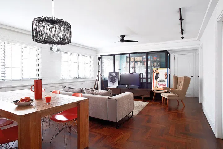 For a contemporary take on Parisian-style living, the homeowner went with a muted colour scheme and classic herringbone flooring. 