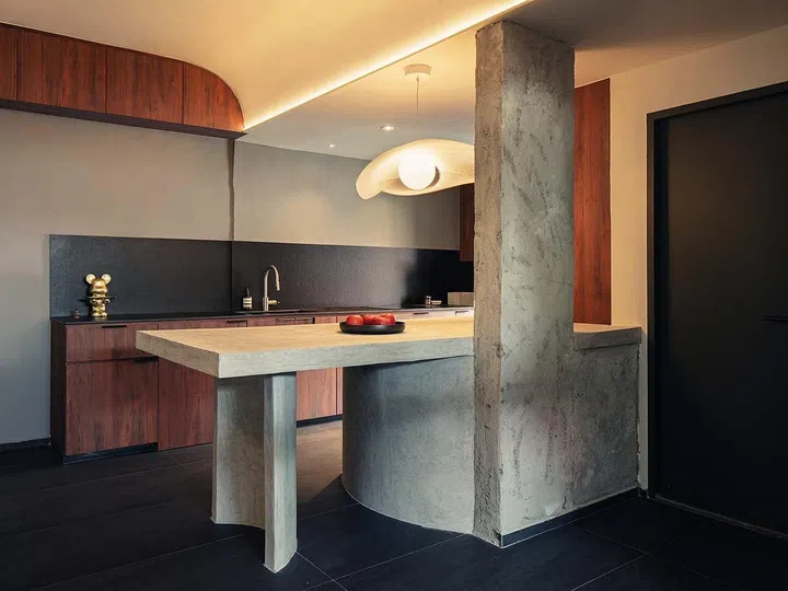 . The addition of a peninsula island gives the kitchen a more open feel that allows it to connect better with the other spaces.