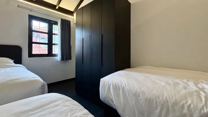 The sleeping arrangement in a Maisonette room was a little tight, with 2 of the wardrobe setup next to the stairwell.