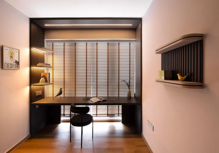 The study includes a custom-built desk. 
