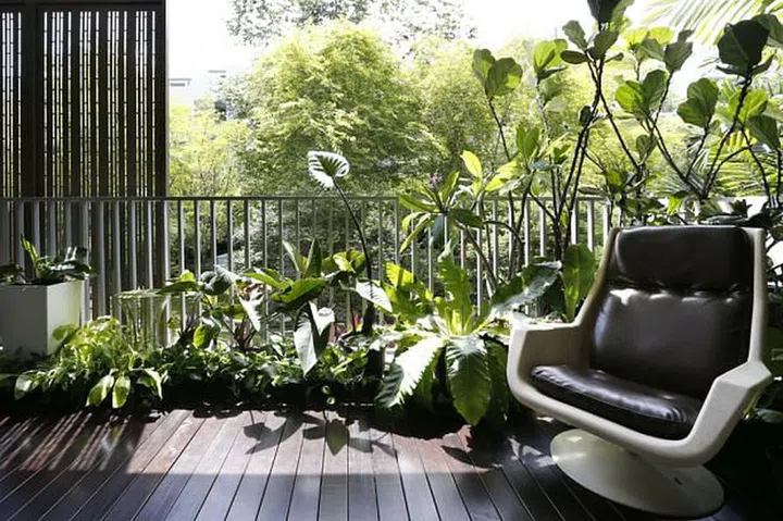 Mr Quan's favouritie spot is the balcony where he tends to his plants. A lounge chair placed there used to belong to Ms Chan's mother.