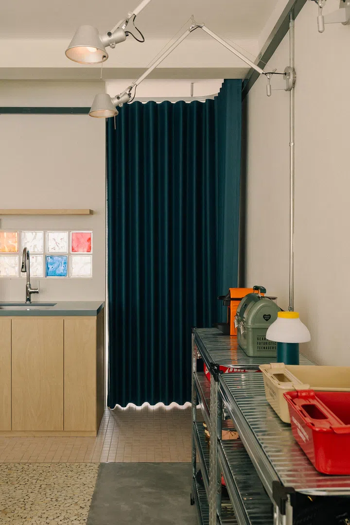 Throughout the home are subtle industrial-cool elements contrasted with pops of colour.