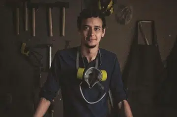 Mr Gregory Swyny (above) specialises in customised woodwork, and some of the pieces that he has done include tables, cabinetry, and lifestyle products; and mobile bar. Photo: The Woodwork Initiative