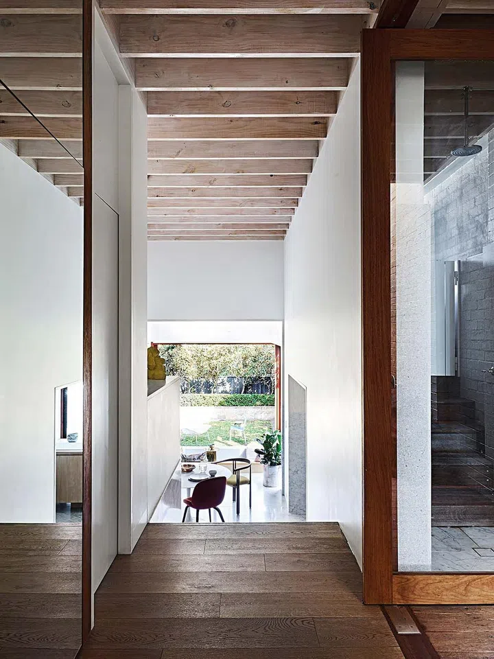 The spacious interiors merge seamlessly with the outdoors during the day.