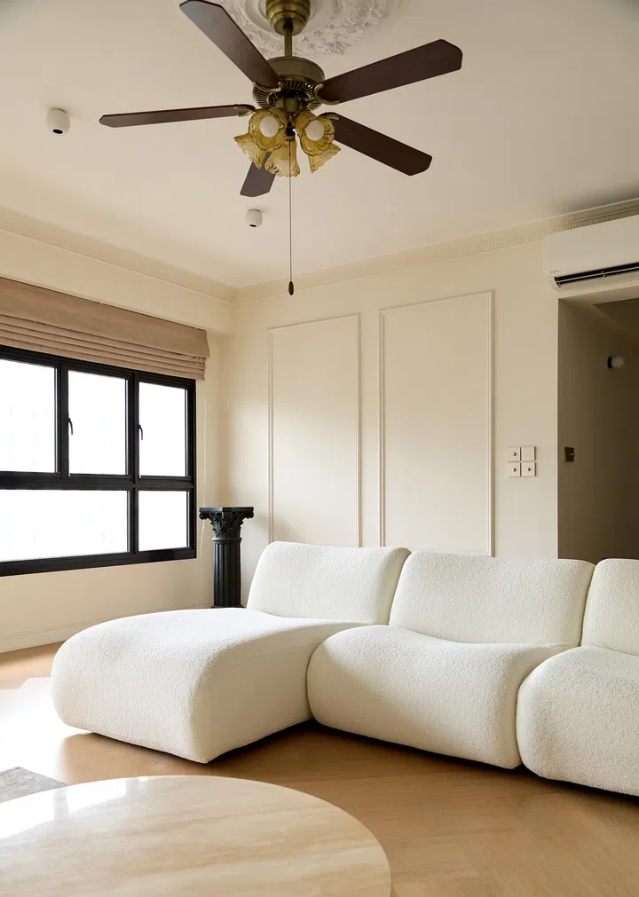 The living room is stylish, warm, and inviting.