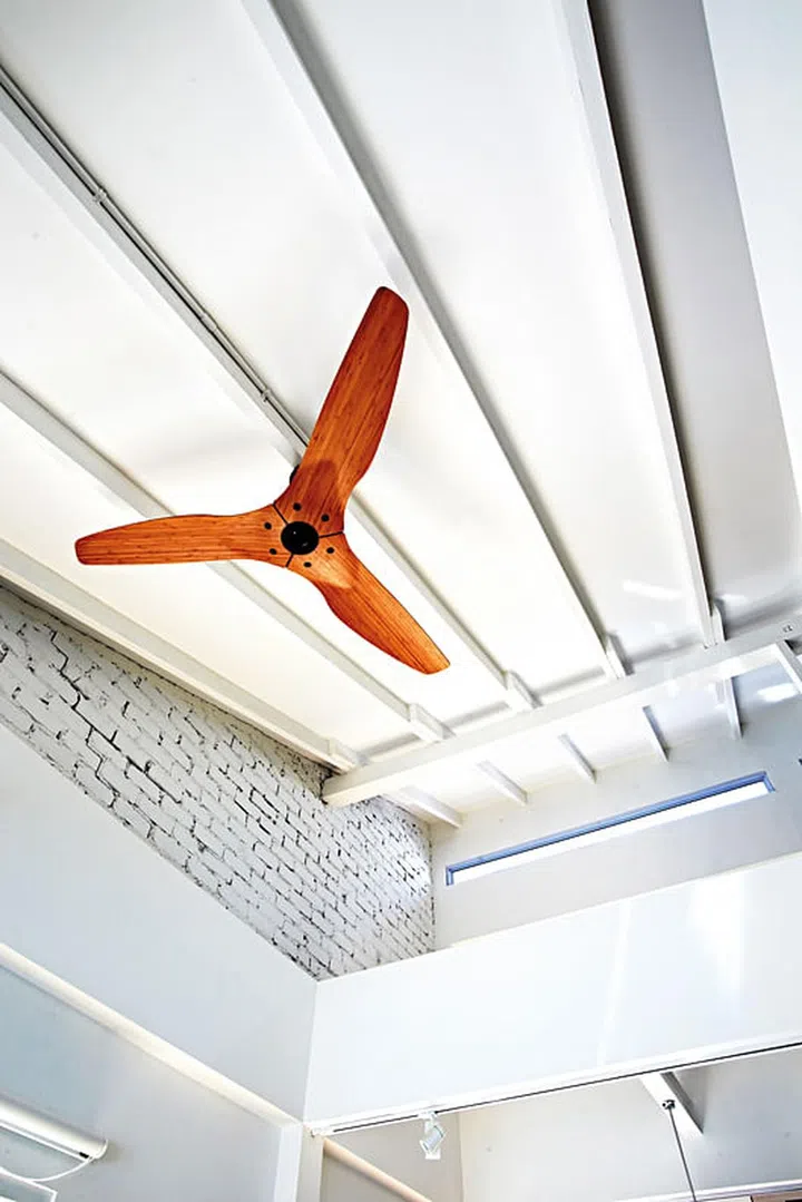 The sleek, simple design of the Haiku ceiling fan fits right in with the “wood and white” palette. (Reno: $300K)