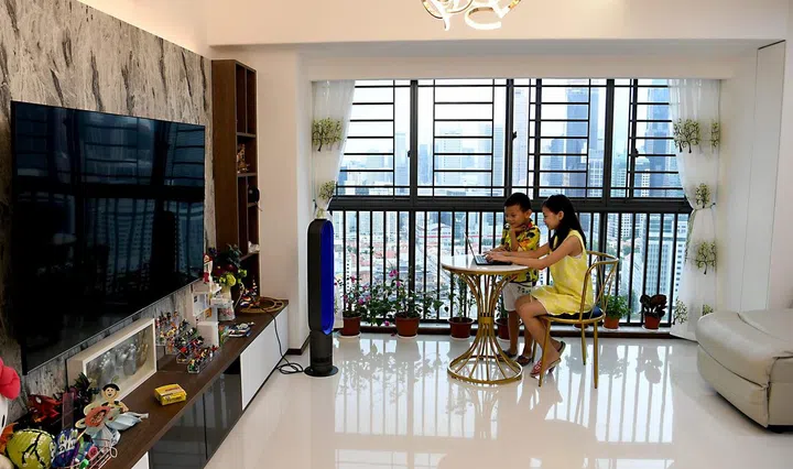 Siblings Matthew, five, and Bella, 10, live with their parents in a five-room HDB flat on the 42nd floor at The Pinnacle @ Duxton. The family bought the unit for $1.232 million in March 2020, in the third-most expensive HDB resale flat transaction ever.