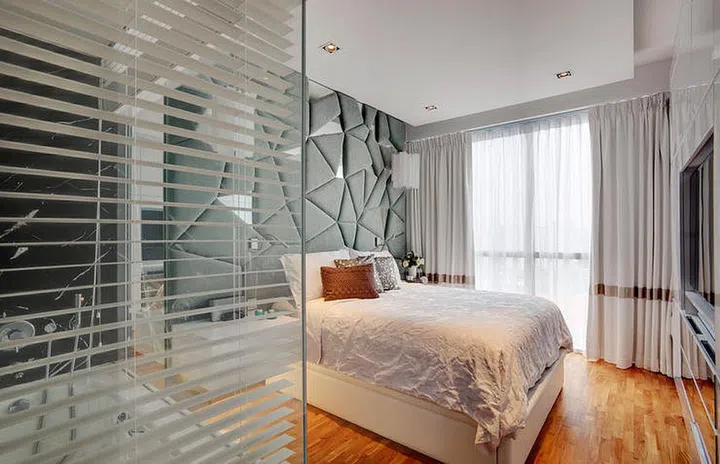 Glass panel bathroom in the master bedroom in a family of four's condominium in Marine Parade. $100,000 Renovation by interior designer Lisa Ng from Ansana.