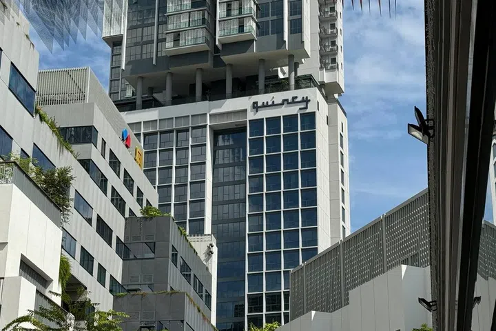 Exterior view of Quincy House from One Holland Village.