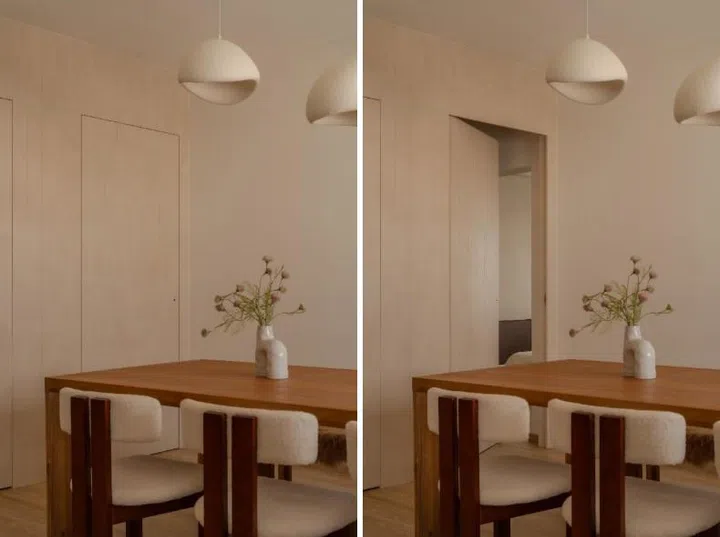 Concealed doors recede into timber walls, while rounded furniture and sculptural pendants create a calm, everyday dining setting.