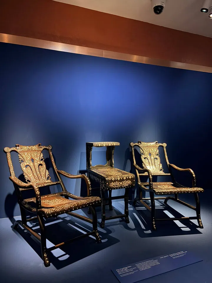 Mother-of-pearl blackwood (or rosewood) set of lounge chairs and a Qing-dynasty style two-tiered table (designed to fit a telephone) from the brokerage firm Kay Hian & Co. family. The family wasn’t Peranakan, but were closely related to Peranakans by marriage.