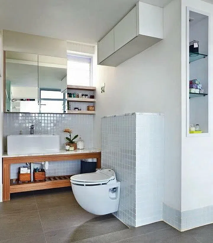Simple white and neutral HDB bathroom. Interior design by Museum Homes