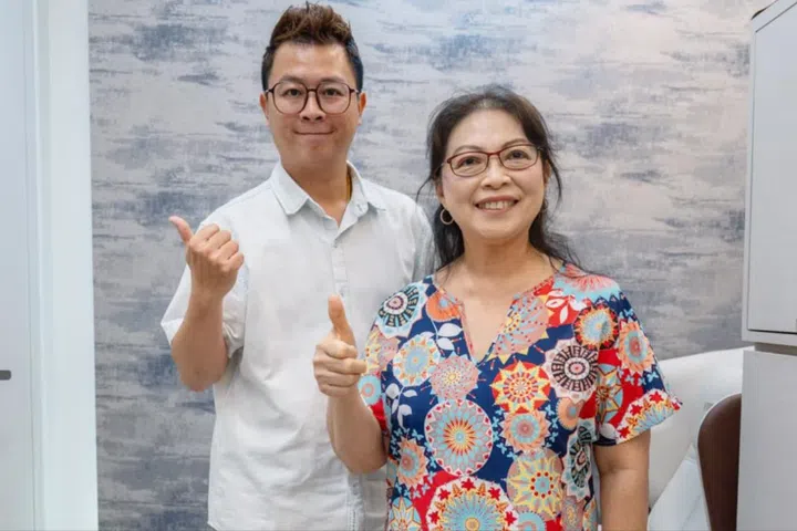 Homeowner Christine Ang and interior designer Benny Poon in her two-room flexi flat in Tengah..